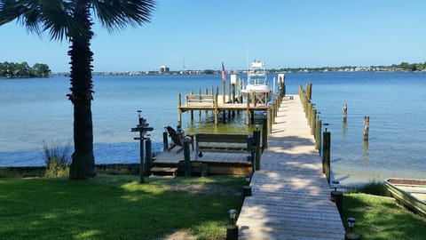 Access to large backyard,  private dock and fishing.