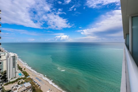 Direct Beach Access with Lounge Chairs and Umbrella's