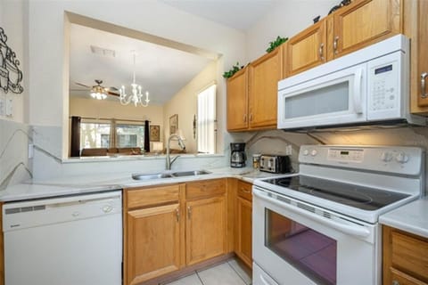 Quartz counter top and backsplash; new appliances; and kitchen pantry