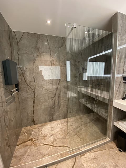 Exclusive Suite, 1 King Bed, Terrace, Golf View | Bathroom | Eco-friendly toiletries, hair dryer, towels