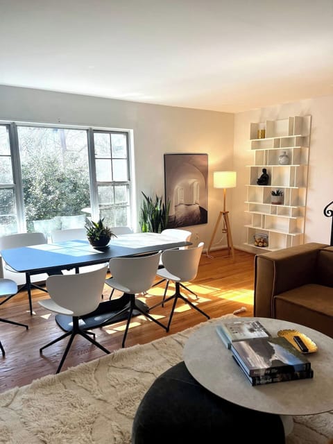 The family room and dining area are furnished with beautiful furniture from BoConcept