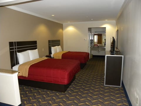 Premium bedding, pillowtop beds, desk, blackout drapes