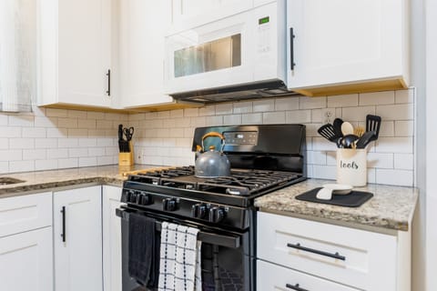 A kitchen that's the heart of the home. This is where families gather to cook, eat, and create memories that will last a lifetime.