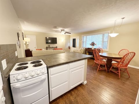 Kitchen has a large work space overlooking the living area