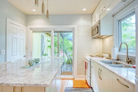 Kitchen has sliders to the deck