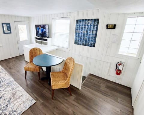 Dining table with chairs for 2 plus additional dining at the snack bar