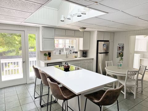 Open kitchen and dining to cook and enjoy a meal at home