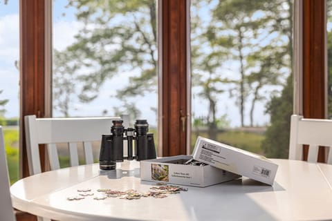 Play a board game or watch the sunset over the lake