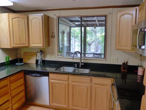 Kitchen overlooking the breakfast bar and Suwannee River
