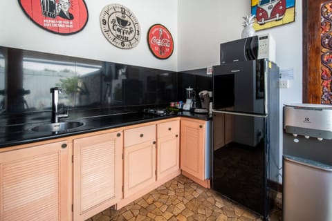 Kitchen with refrigerator
