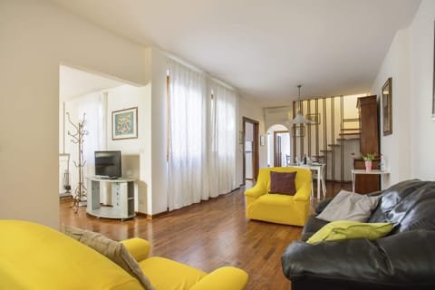 Basic Apartment, Multiple Beds | Living area | TV
