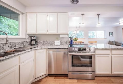 Fully stocked kitchen includes extras like spices, wine glasses, pizza cutter...