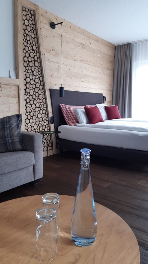 Superior Double Room | Living area | 50-inch flat-screen TV with satellite channels, heated floors