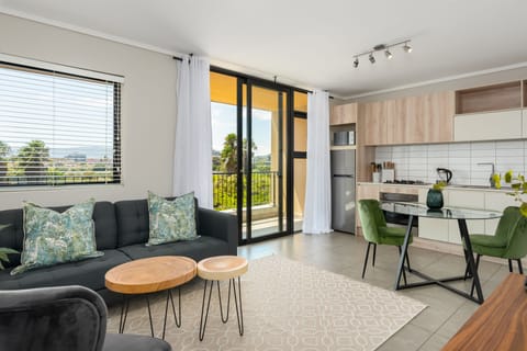 Grand Apartment | Living area | 40-inch flat-screen TV with cable channels, TV, Netflix