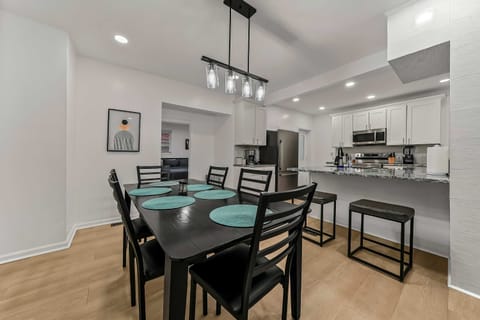 Bright, open-concept dining and kitchen space—perfect for shared meals, morning coffee, and relaxing after a day of exploring. Fully equipped, stylish, and designed for comfort.