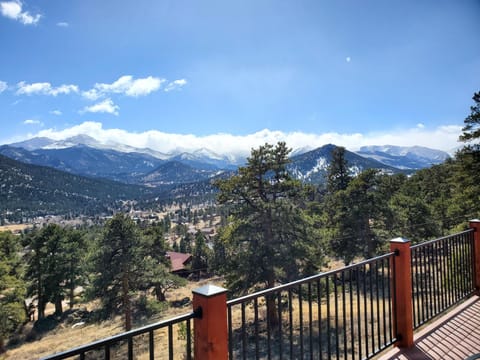 Spacious deck with panoramic mountain and valley views