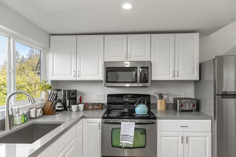 Generous countertops, cabinet space, kitchen essentials, and a few "extras" make it FUN to cook.