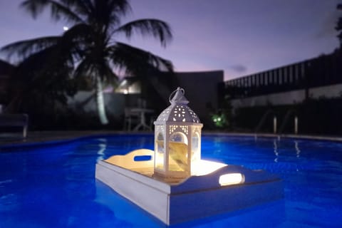Our pool has pretty lights in the evening