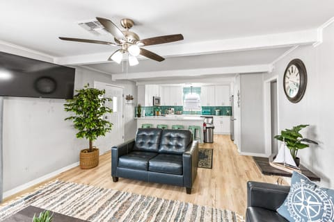 Bright, airy retreat with island decor and plush seating for ultimate relaxation