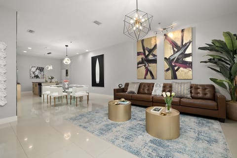 Open concept Living Area leads to the Dining and Kitchen Areas