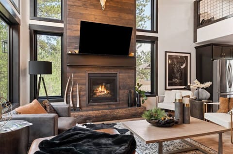 Stone fireplace for cozy nights after a day on the trails or slopes. 