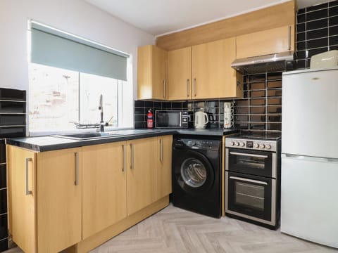 Fridge, electric kettle, toaster, cookware/dishes/utensils