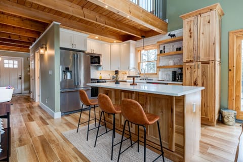 Kitchen with Island and all new Whirlpool Professional Series Appliances.  Including gas stove and ice maker.