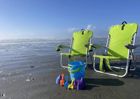 Head to the beach, we have chairs and toys!