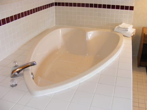 Romantic Room, 1 King Bed, Jetted Tub, Balcony | Deep soaking bathtub