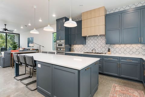Spacious kitchen with bar seating