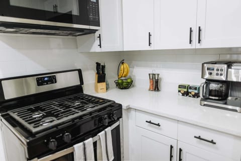 Cook with ease in our fully-equipped, modern kitchen. Featuring sleek stainless steel appliances, ample counter space, and all the essentials for a gourmet meal at home.