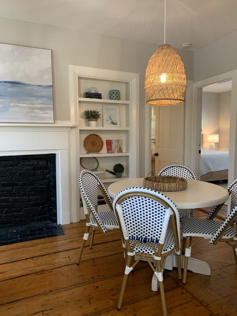 Dining room with building book shelves with lots of good Summer reads :)
