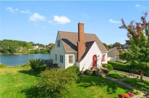 Cute Cape Style home on the banks of the cove