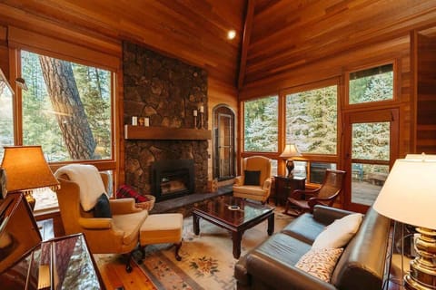 Living room with piano and fireplace. Unfortunately, the fireplace is unavailable for guest use at this time.