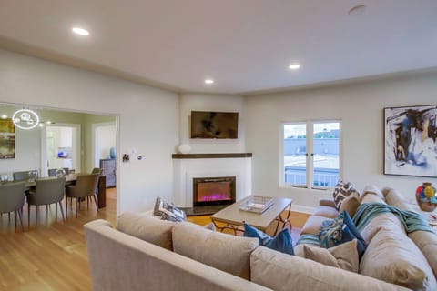 Settle into the living room, complete with a TV for cozy movie nights and relaxed downtime.