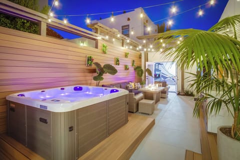 Unwind and recharge in the private hot tub after a day of exploring.