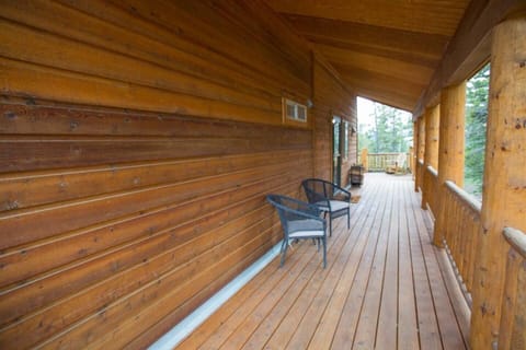 The covered part of the wrap around deck has seating as well