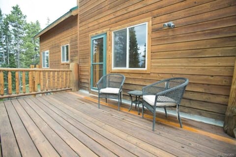 The deck off the bedroom on the main level is private and has seating