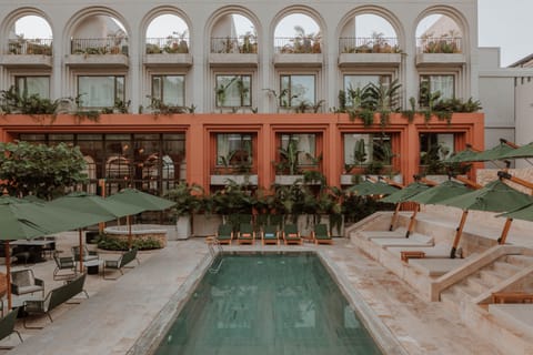 2 outdoor pools, open 9:00 AM to 6:00 PM, free cabanas, pool umbrellas