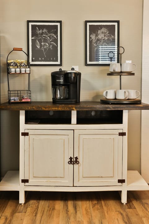 Stylish coffee bar in the kitchen with Keurig coffee pot and all the condiments