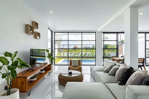Deluxe Villa, 2 Bedrooms | Living room | 50-inch Smart TV with digital channels, TV