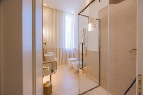 Superior Triple Room | Bathroom | Hair dryer, bidet, towels, soap
