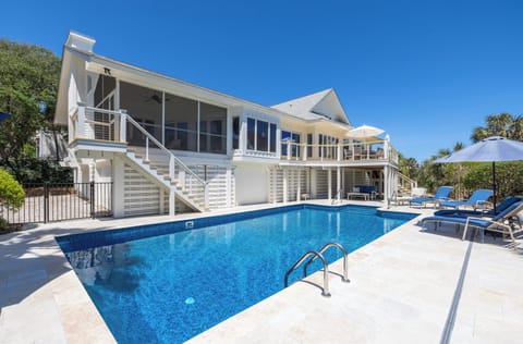 Welcome to 30 Beachwood East, a stunning oceanfront getaway with a sparkling private pool, expansive decks, and direct beach access