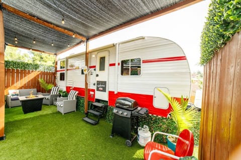 Enjoy your private patio area equipped with firepit, grill, and furniture
