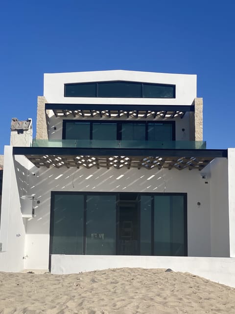 Ocean side of the house. Two patio upper and lower looking directly at ocean