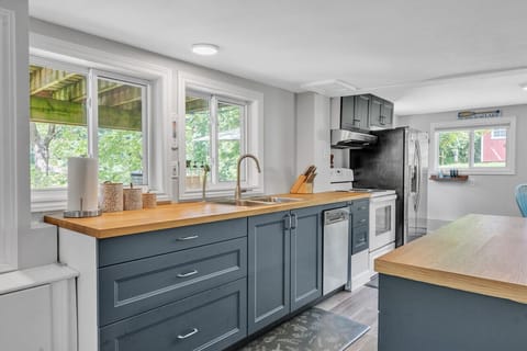 Kitchen windows look right out at the lake!