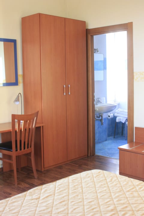 Desk, laptop workspace, free WiFi, bed sheets