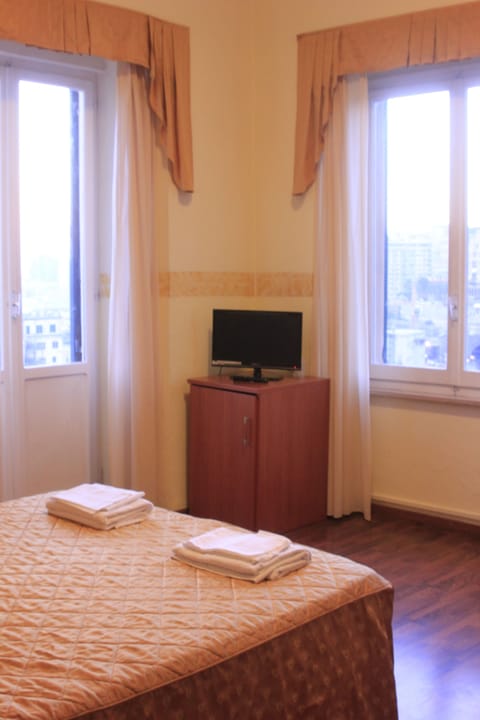 Desk, laptop workspace, free WiFi, bed sheets