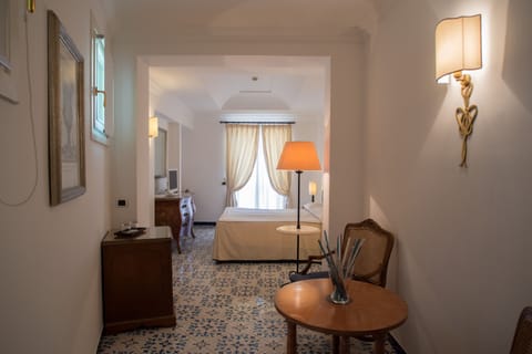 Suite, Sea View, Corner | Down comforters, minibar, in-room safe, desk