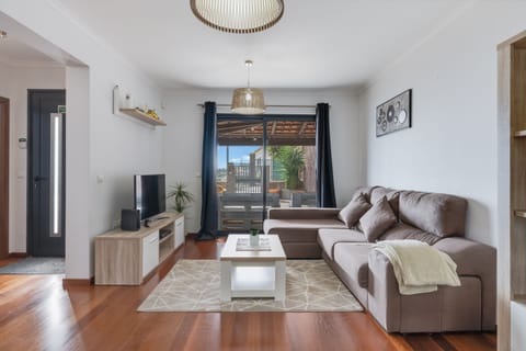 Family Villa | Living area | 42-inch flat-screen TV with cable channels, TV